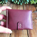 back stitching detail of a leather card wallet