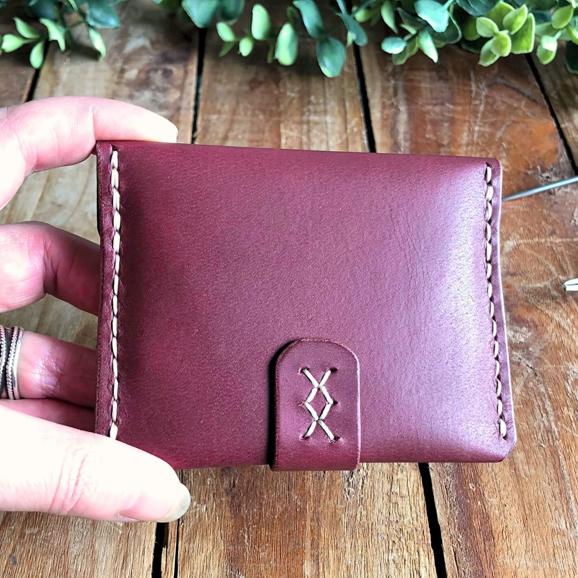 back stitching detail of a leather card wallet