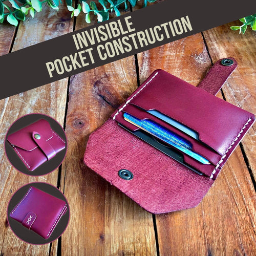Leather Card Wallet, front, open, and back, filled with cards on a wooden background and a banner saying ''invisible pocket construction''