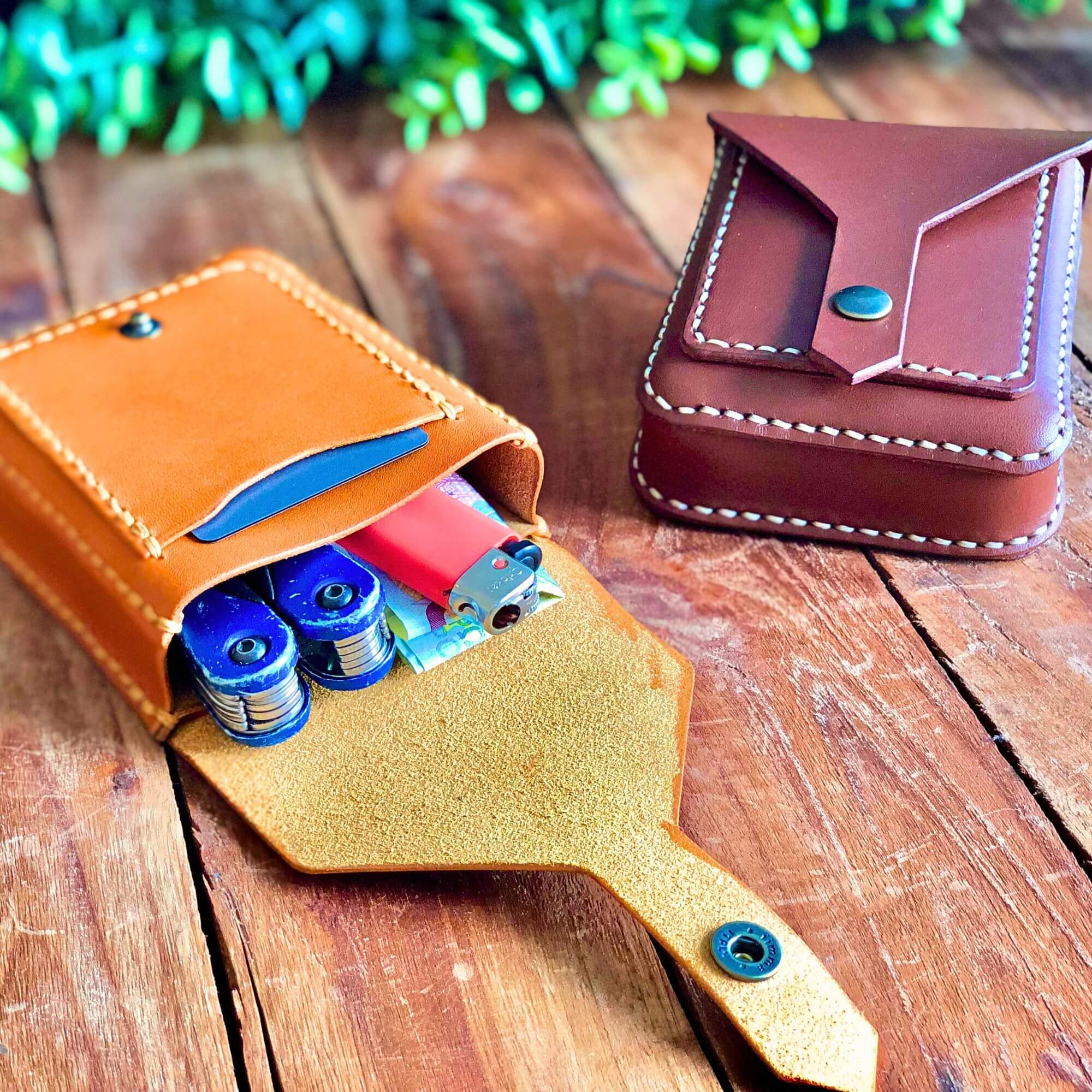 compact leather belt bag filled with small belongings