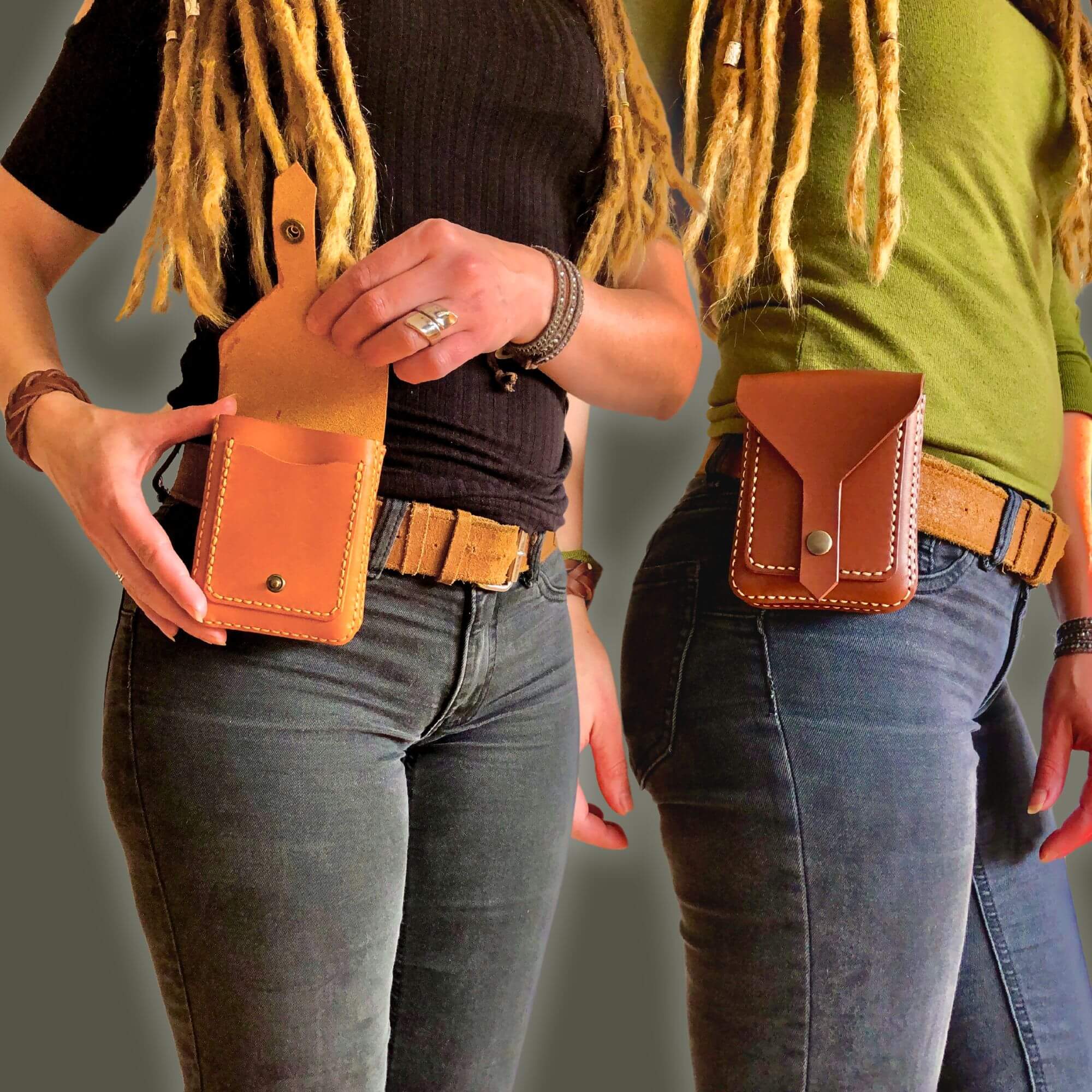 Two people wearing compact brown leather belt bags on belts against a neutral background