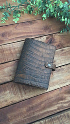 Video showing a Handmade Brown Leather Alligator Embossed Book Cover 