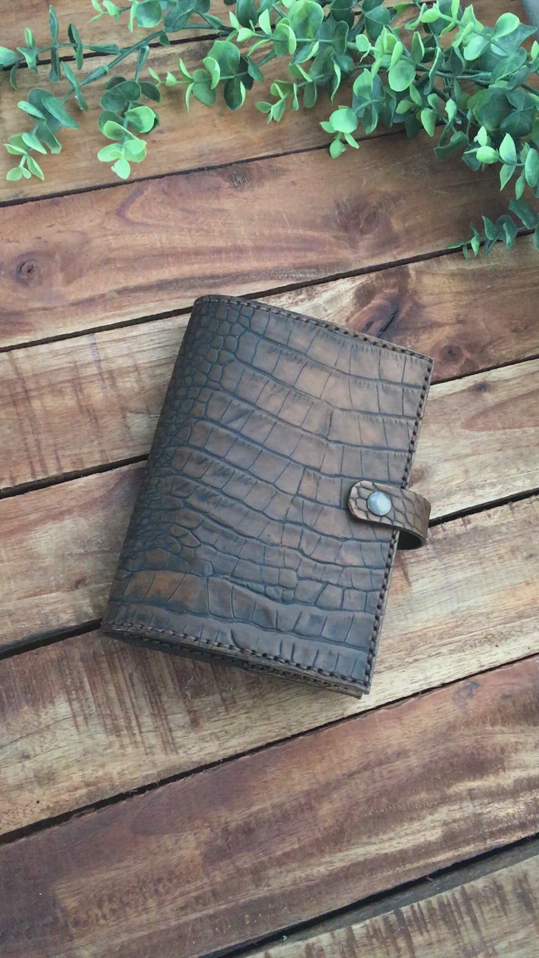 Video showing a Handmade Brown Leather Alligator Embossed Book Cover 
