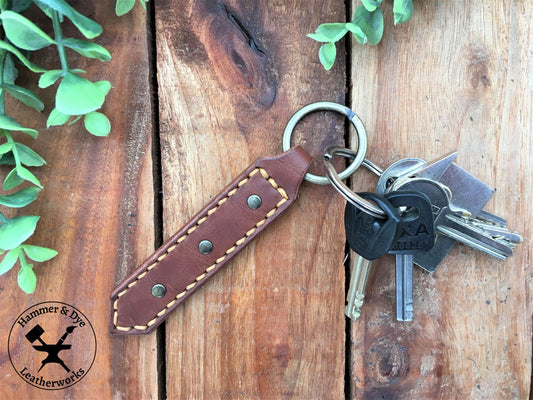 Handmade Brown Leather Studded Keychain with Hazel Stitching and a bunch of keys