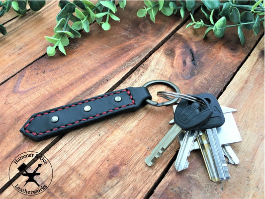 Handmade Black Leather Studded Keychain with Red Stitching and a bunch of keys