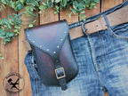 Large Handmade Black Leather Belt Pouch with Buckle closing and Studs on a trouser belt